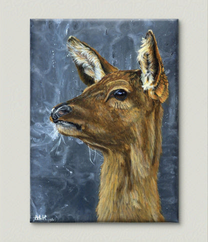 Mockup of the original painting "Frozen in Time" by Abigail Hemmings, featuring a realistic acrylic portrait of a doe exhaling frosty breath in cold air.
