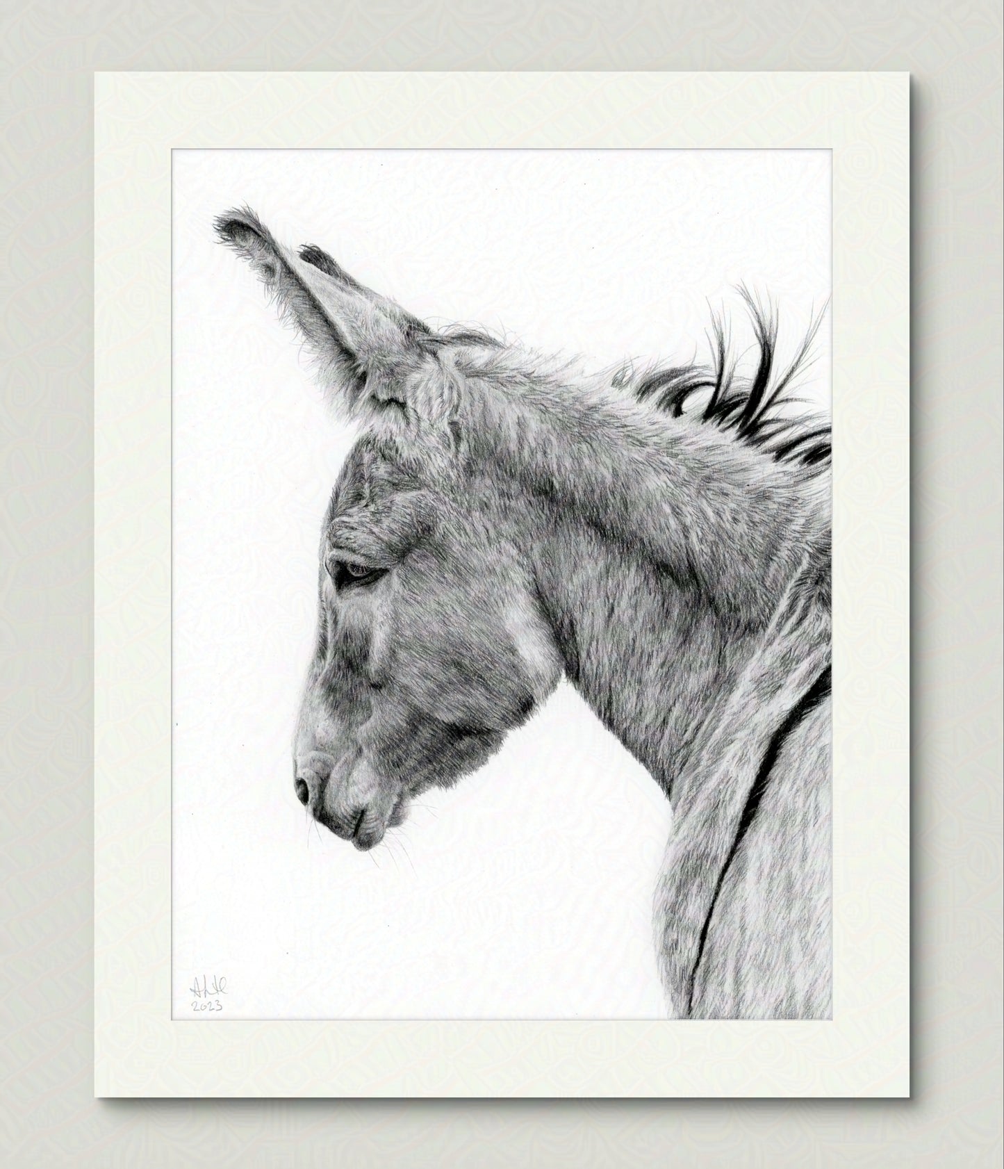 Mockup of the original graphite drawing "The Thoughtful Watcher" by Abigail Hemmings, showing a realistic donkey in profile with soft, expressive detail.